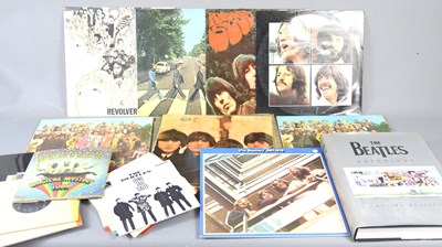 Lot 408 - A group of Beatles LPs and 7" single records,...