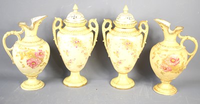 Lot 198 - A set of four cream ground vases and ewers,...