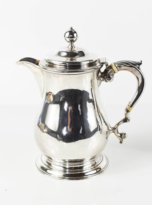 Lot 3 - A George II silver coffee pot of baluster form,...