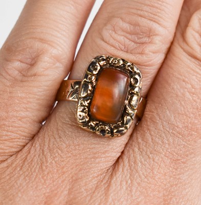 Lot 41 - A 12ct gold Georgian ring, set with an agate...