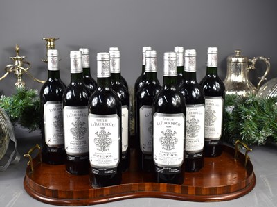 Lot 33 - Twelve bottles of Chateau La Fleur de Gay,...