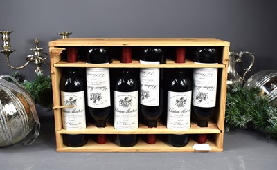 Lot 64 - A case of twelve bottles of Chateau Montrose...