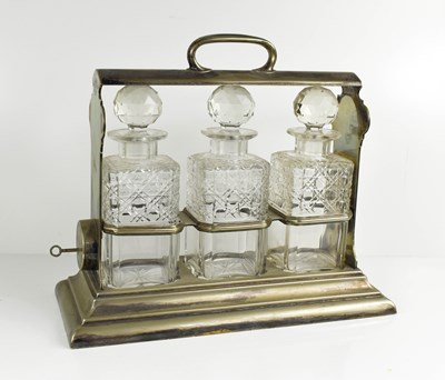 Lot 114 - A Walker and Hall silver plated tantalus, with...