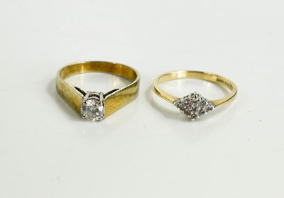 Lot 222 - A 9ct gold and diamond ring, set with nine...