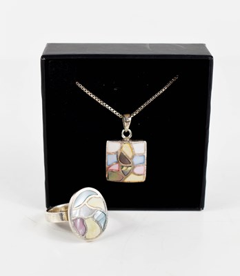 Lot 22 - A silver and enamelled ring with matching...