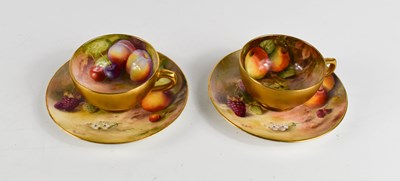 Lot 131 - A pair of Royal Worcester miniature cups and...