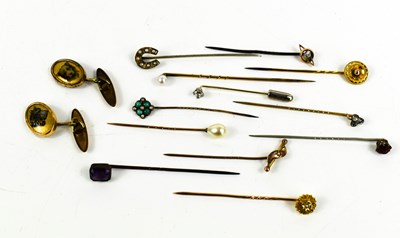 Lot 469 - A group of twelve stick stock pins including...