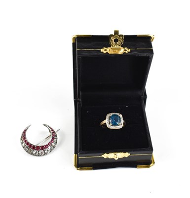 Lot 224 - A 9ct gold dress ring, set with teal blue...