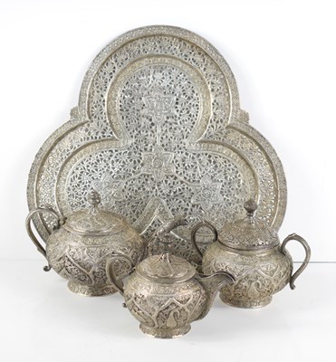 Lot 23 - An Indian white metal tea service, comprising...