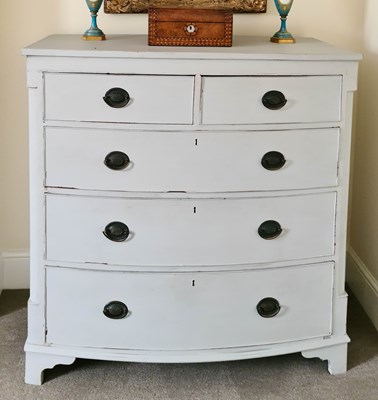 Lot 558 - A Victorian painted chest of drawers with bow...
